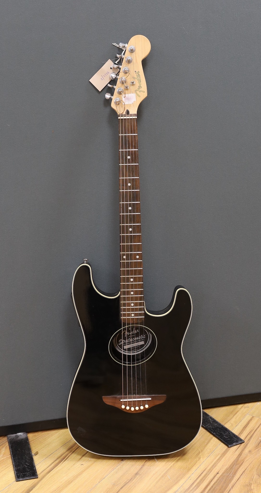 A Fender Stratacoustic electric guitar, serial no. CD04122687